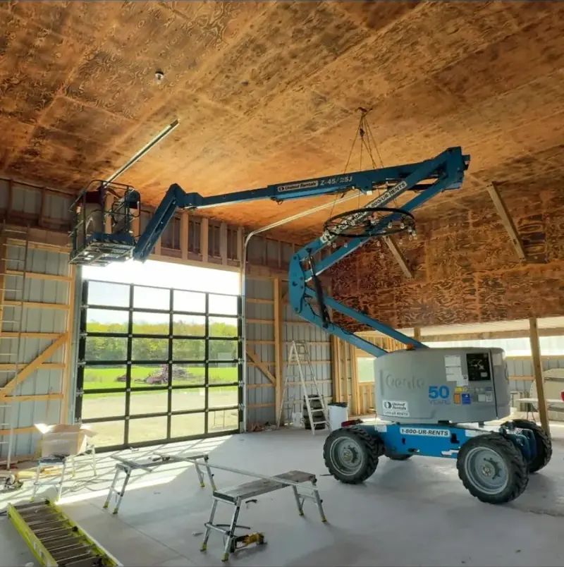 Full-view overhead door in a timber-frame building